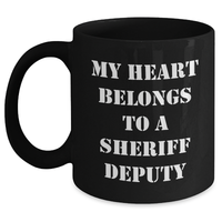 Load image into Gallery viewer, Funny Sheriff Deputy Gifts from Men to Sheriff Deputy on Father&#39;s Day - Black Coffee Mug with &#39;My Heart Belongs To A Sheriff Deputy&#39; Quote - Main
