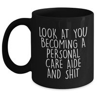 Load image into Gallery viewer, Funny Personal Care Aide Gifts from Friends for Men and Women - &#39;Look At You Becoming...&#39; Black Coffee Mug for Graduation - Main
