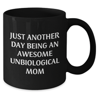 Load image into Gallery viewer, Gifts from Loved Ones for Awesome Unbiological Mom, Funny Quote Black Coffee Mug - Unbiological Mom Gifts for Graduation - Inspirational Mom&#39;s Daily Grind - 11oz or 15oz Black Ceramic Mug - Additional
