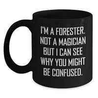 Load image into Gallery viewer, Funny Forester Christmas Unique Gifts for Men, Black Coffee Mug with Quirky Quote &#39;I&#39;m A Forester. Not A Magician But I Can See Why You Might Be Confused.&#39; from Friends, Family - Main
