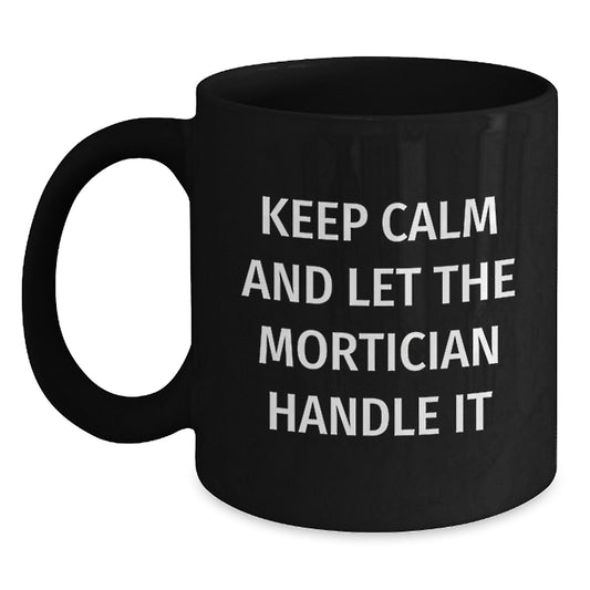 Funny Mortician Gifts from Men - Unique Black Coffee Mugs for Mortician Women - Keep Calm And Let The Mortician Handle It Black Mugs - Main