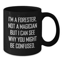 Load image into Gallery viewer, Funny Forester Christmas Unique Gifts for Men, Black Coffee Mug with Quirky Quote &#39;I&#39;m A Forester. Not A Magician But I Can See Why You Might Be Confused.&#39; from Friends, Family - Additional
