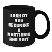Load image into Gallery viewer, Funny Mortician Gifts, Look At You Becoming A Mortician And Shit, Black Coffee Mug for Mortician Graduation, Gifts from Friends, Gifts for Mortician - Additional
