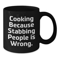 Load image into Gallery viewer, Funny Cooking Humor Gifts from Friends, Valentine's Unique Cooking Mugs for Coffee Lovers, Black Ceramic Mug with 'Cooking Because Stabbing People Is Wrong' Quote - Additional
