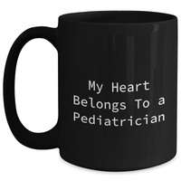 Load image into Gallery viewer, Funny Quote Black Coffee Mug for Pediatrician Gifts from Family on Father&#39;s Day, &#39;My Heart Belongs To A Pediatrician&#39; - Black 11oz or 15oz - Main
