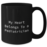 Load image into Gallery viewer, Funny Quote Black Coffee Mug for Pediatrician Gifts from Family on Father&#39;s Day, &#39;My Heart Belongs To A Pediatrician&#39; - Black 11oz or 15oz - Additional
