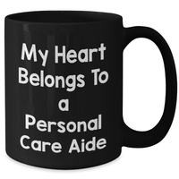 Load image into Gallery viewer, Funny Personal Care Aide Gifts from Men to Friends - My Heart Belongs To A Personal Care Aide Black Coffee Mug for Dad, Him, or Coworkers on Father&#39;s Day - Additional

