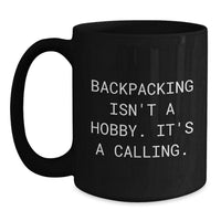 Load image into Gallery viewer, Backpacking Enthusiast Gifts for Birthday, Funny &#39;Backpacking Isn&#39;t A Hobby. It&#39;s A Calling.&#39; Black Coffee Mug, 11oz or 15oz, Microwave and Dishwasher Safe, Gifts from Men to Friends - Main
