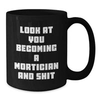 Load image into Gallery viewer, Funny Mortician Gifts, Look At You Becoming A Mortician And Shit, Black Coffee Mug for Mortician Graduation, Gifts from Friends, Gifts for Mortician - Additional
