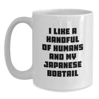 Load image into Gallery viewer, Japanese Bobtail Cat White Coffee Mug, Funny Quote I Like A Handful Of Humans And My Japanese Bobtail, Valentine's Unique Gifts from Men to Japanese Bobtail Cat Lovers - Main
