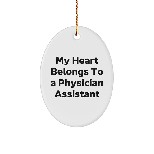 Funny Quote Gifts for Physician Assistant, 'My Heart Belongs To A Physician Assistant', Oval Ornament, White, 3.25'' Tall, Gifts from Family to Physician Assistant for Christmas - Image 1