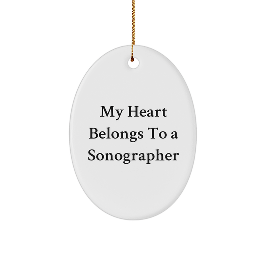 Funny Sonographer Gifts, 'My Heart Belongs To A Sonographer' Oval Ornament, White, 3.25" Tall, For Gifts from Family, Friends, or Coworkers to Sonographer - Image 1