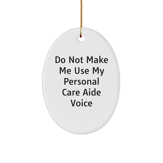 Funny Personal Care Aide Gifts from Men to Women for Christmas - 'Do Not Make Me Use My Personal Care Aide Voice' Oval Ornament - Image 1