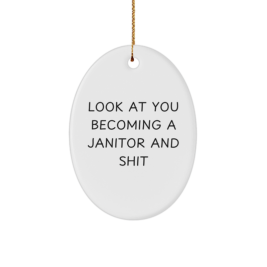 Funny Janitor Gifts, Oval Ornament, 'Look At You Becoming A Janitor And Shit' Quote, Gifts from Men to Janitor, Unique Christmas Unique Gifts for Janitor - Image 1