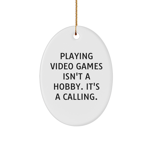 Playing Video Games Gifts for Men, Women, and Friends - Christmas Oval Ornament with Quote 'Playing Video Games Isn't A Hobby. It's A Calling.' - from Family - Image 1