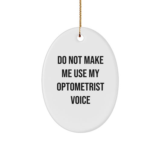 Optometrist Gifts from Friends - 'Do Not Make Me Use My Optometrist Voice' Oval Ornament for Christmas - Image 1