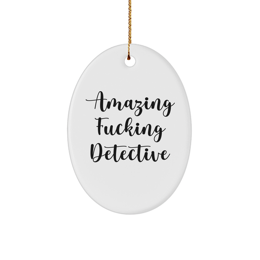 Detective Oval Ornament - Amazing F--ing Detective Christmas Unique Gift for Men Women Friends Family - White 3" Oval-Shaped Sturdy MDF Ornament with Gold-Tone String - Image 1
