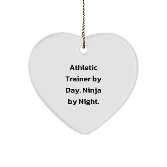 Funny Athletic Trainer Gifts from Family - Heart Ornament for Men or Women, 'Athletic Trainer By Day. Ninja By Night.' Christmas Unique Decor - Image 1