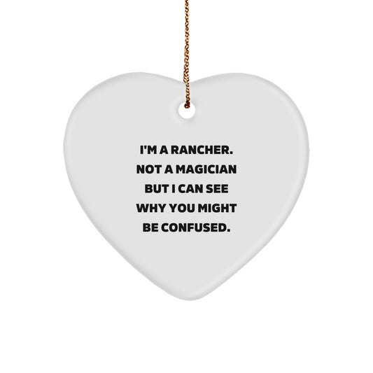 Funny Rancher Gifts, Unique Heart Ornament for Friends, 'I'm A Rancher. Not A Magician' Christmas Decor - Image 1