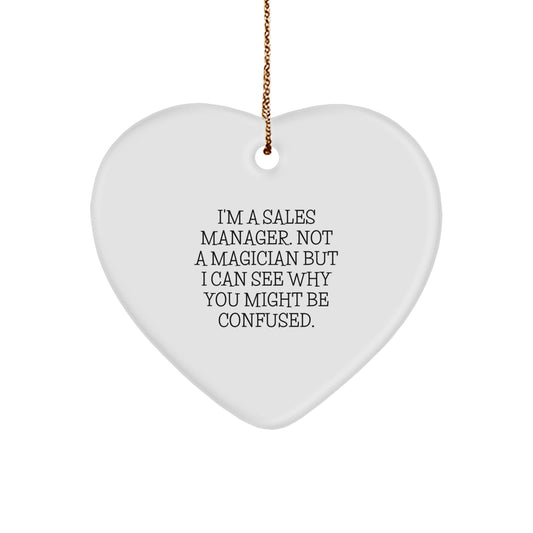 Funny Sales Manager Heart Ornament Gifts from Friends to Men, 'I'm A Sales Manager. Not A Magician But I Can See Why You Might Be Confused.', Heart-Shaped White Ornament for Christmas - Image 1