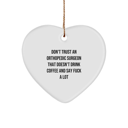 Funny Orthopedic Surgeon Gifts, Heart Ornament for Men, Gifts from Friends to Orthopedic Surgeon, 'Don't Trust An Orthopedic Surgeon That Doesn't Drink Coffee And Say F--k A Lot' - Image 1