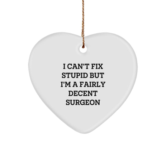 Surgeon Gifts from Friends, Family, or Coworkers - Heart Ornament with Funny Quote 'I Can't Fix Stupid But I'm A Fairly Decent Surgeon' for Christmas - Image 1