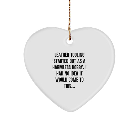 Funny Leather Tooling Gifts from Friends, Coworkers, or Family - Heart Ornament with Christmas Quote 'Leather Tooling Started Out As A Harmless Hobby...' - Image 1
