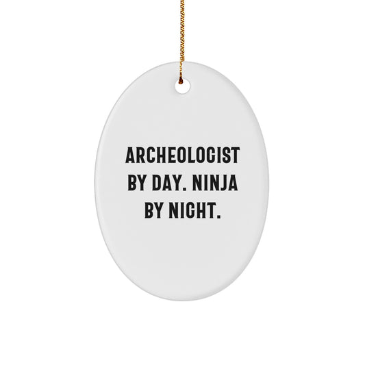 Archeologist Gifts from Friends, Unique Oval Ornament for Men, Women, Coworkers, Family - 'Archeologist By Day. Ninja By Night.' Christmas Decor - Image 1