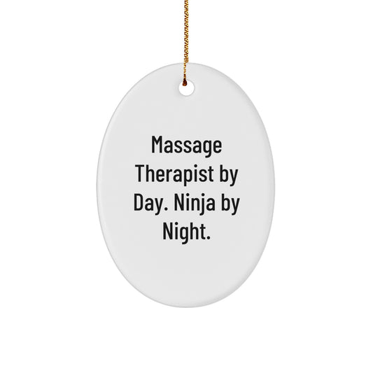 Funny Massage Therapist Gifts from Men - Oval Ornament for Christmas Unique Gifts - 'Massage Therapist By Day. Ninja By Night.' - Image 1