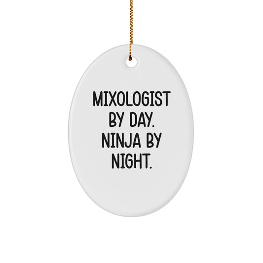 Mixologist Gifts from Friends, Oval Christmas Ornaments with Funny Quote, 'Mixologist By Day. Ninja By Night.' - Image 1