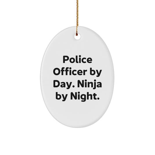 Funny Police Officer Gifts, Christmas Unique Ornament for Men, Oval Shape with 'Police Officer By Day. Ninja By Night.' Quote, Gifts from Family, Friends, Coworkers - Image 1
