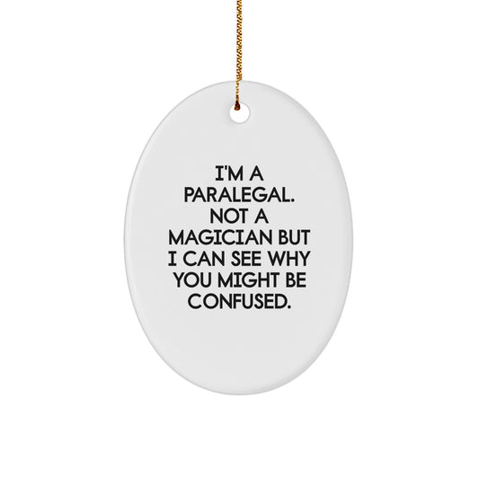 Gifts from Friends - Paralegal Christmas Oval Ornament - Funny Quote I'm A Paralegal Not A Magician - White Oval Shaped Durable MDF Decorations - Image 1