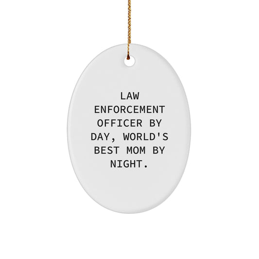 Funny Law Enforcement Officer Gifts, Cute Oval Ornament Quote 'By Day, World's Best Mom By Night', Gifts from Family to Law Enforcement Officer Men Women Friends - Image 1