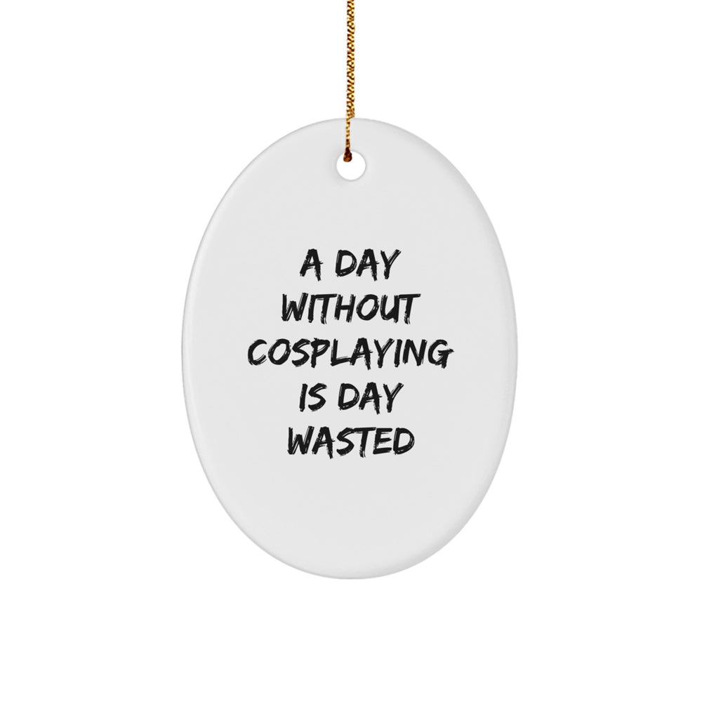 Cosplaying Gifts from Friends for Men, Women, and Family - Oval Ornament with 'A Day Without Cosplaying Is Day Wasted' Quote, Christmas Unique Gifts - Image 1