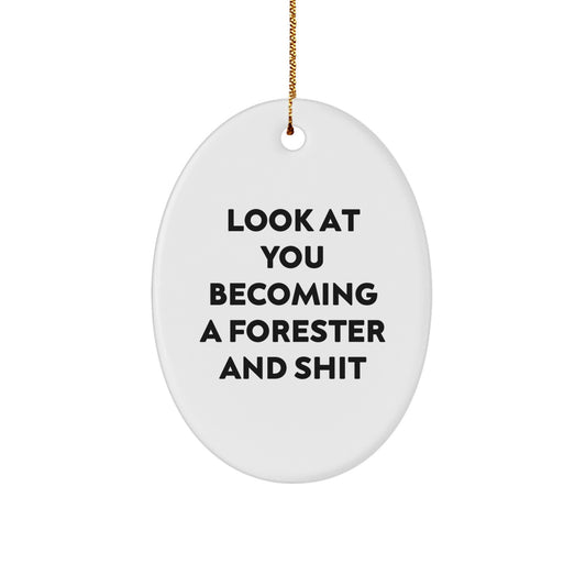 Funny Forester Gifts from Friends for Men - Oval Ornament with 'Look At You Becoming A Forester And Shit' Quote, Unique Christmas Unique Gifts - Image 1