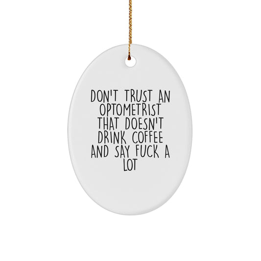 Funny Optometrist Gifts for Christmas - Oval Ornament from Friends - 'Don't Trust An Optometrist That Doesn't Drink Coffee And Say F--k A Lot' Quote - Image 1