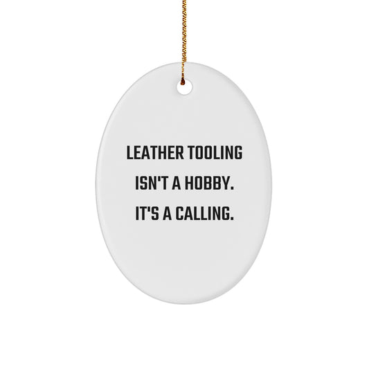 Leather Tooling Gifts from Friends and Family, Oval Ornament for Men and Women, Christmas Unique Ornaments, Funny Quote - 'Leather Tooling Isn't A Hobby. It's A Calling.' - Image 1