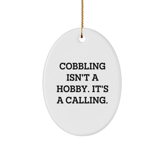 Cobbling Gifts From Friends - Inspirational Oval Ornament for Christmas, 'Cobbling Isn't A Hobby. It's A Calling.' Quote - Image 1