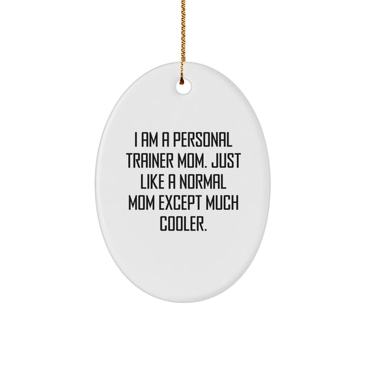 Funny Personal Trainer Mom Gifts for Christmas, Oval Ornament with 'I Am A Personal Trainer Mom. Just Like A Normal Mom Except Much Cooler.' Quote, Gifts from Family to Personal Trainer Friends - Image 1