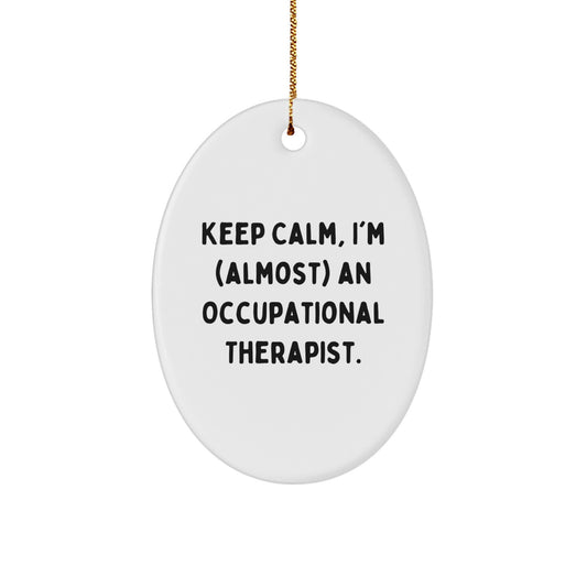 Funny Occupational Therapist Gifts for Christmas - Oval Ornament 'Keep Calm, I'm (almost) An Occupational Therapist' from Friends and Family - Image 1
