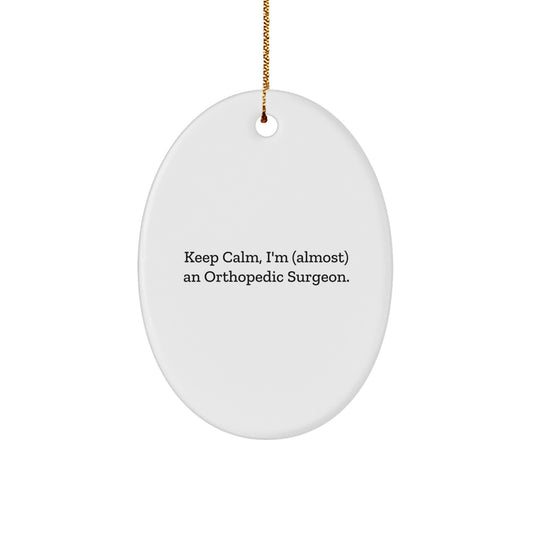 Funny Orthopedic Surgeon Gifts from Friends for Orthopedic Surgeon Christmas Unique Gifts for Christmas Decor Oval Ornament, Keep Calm I'm almost an Orthopedic Surgeon - Image 1