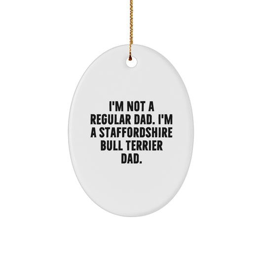 Funny Staffordshire Bull Terrier Dad Gifts for Men, Oval Ornament with Christmas Quote 'I'm Not A Regular Dad. I'm A Staffordshire Bull Terrier Dad.' - Image 1