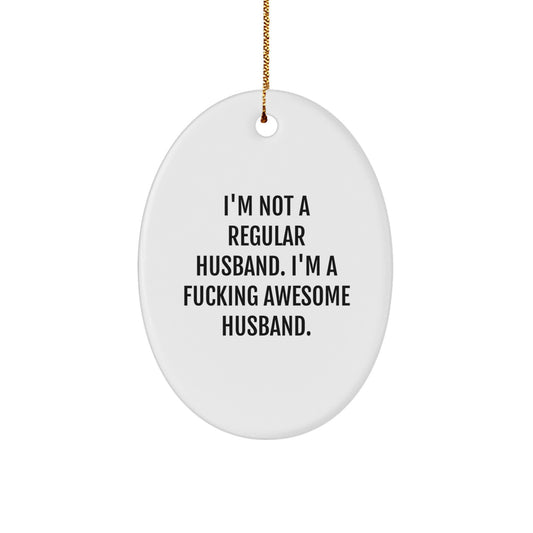 Funny Husband Gifts, Unique Oval Ornament for Him, 'I'm Not A Regular Husband. I'm A F--king Awesome Husband.' Christmas Decorations - Image 1